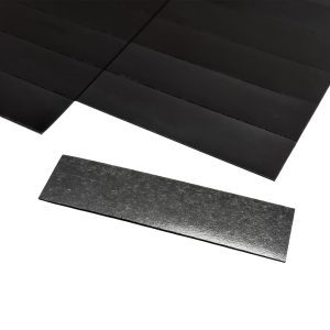 a black rectangular object next to a black rectangular object
