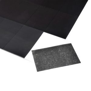 a black rectangular object on a white surface