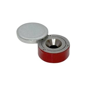 a round metal object with a round cap