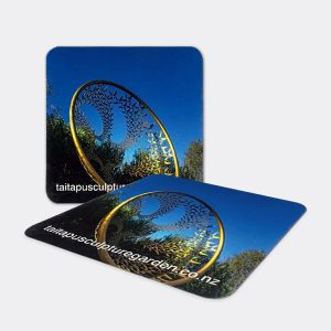 a pair of coasters with a circular design