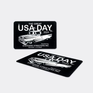 a black and white card with a car on it